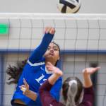 Thunder Mountains Mariah Tanuvasa-Tuvaifale spikes the ball against Ketchikans Autumn Yeisley at TMHS on Friday, Sept. 14, 2018. TMHS won 3-0. (Michael Penn | Juneau Empire)