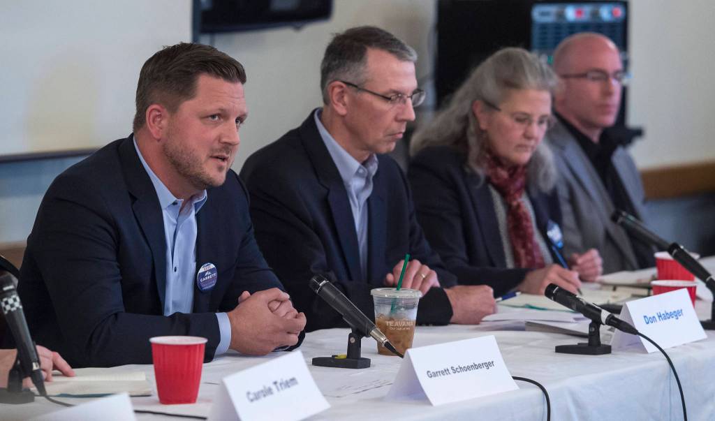 Juneau Assembly candidates for two District 2 seats speak to the Juneau Chamber of Commerce during its weekly luncheon at the Moose Lodge on Thursday, Sept. 20, 2018. From left: Garrett Schoenberger, Don Habeger, Michelle Bonnet Hale and Wade Bryson. District 2 candidate Emil Mackey did not attend the event because of work travel. (Michael Penn | Juneau Empire)