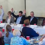 Juneau Assembly candidates for the Areawide and District 2 seats are asked to raise their hand if they support the Juneau Access Project during a forum at the Juneau Chamber of Commerce during its weekly luncheon at the Moose Lodge on Thursday, Sept. 20, 2018. District 2 candidate Emil Mackey did not attend the event because of work travel. (Michael Penn | Juneau Empire)
