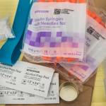 A drug user kits with clean syringes at the Four As office on Friday, Sept. 21, 2018. Juneaus Four As office in Juneau is in danger of closing because of a lack of funding, and are employing a crowdfunding approach to try and gain $15,000 by Oct. 15. (Michael Penn | Juneau Empire)