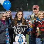Family and friends celebrate senior night with cheerleaders and players before Juneau Uniteds game against Colony at Thunder Mountain High School on Friday, Sept. 21, 2018. (Michael Penn | Juneau Empire)