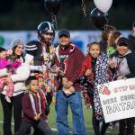 Family and friends celebrate senior night with cheerleaders and players before Juneau Uniteds game against Colony at Thunder Mountain High School on Friday, Sept. 21, 2018. (Michael Penn | Juneau Empire)
