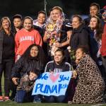 Family and friends celebrate senior Puna Toutaiolepo before Juneau Uniteds game against Colony at Thunder Mountain High School on Friday, Sept. 21, 2018. (Michael Penn | Juneau Empire)
