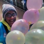 Cagney Davis, 11, smiles while her team puts together a balloon tower using nothing except for balloons and masking tape. The group challenge kicked off Introduce a Girl to Engineering Day at Centennial Hall. (Ben Hohenstatt | Capital City Weekly)