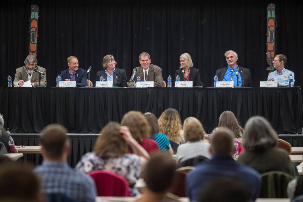 Legislative candidates answers questions during the Native Issues Forum at the Elizabeth Peratrovich Hall on Tuesday, Sept. 25, 2018. From left: Moderator Rep. Sam Kito III, D-Juneau, House District 33 candidates Chris Dimond and Sara Hannan, House District 34 candidates Jerry Nankervis and Andi Story, and Senate District Q candidates Don Etheridge and Jesse Kiehl. (Michael Penn | Juneau Empire)