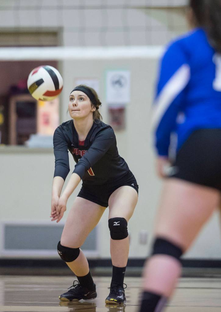 Juneau-Douglas Riley Stadt bumps the ball up against Petersburg at JDHS on Friday, Sept. 28, 2018. (Michael Penn | Juneau Empire)