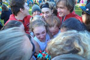 Juneau-Douglas Sadie Tuckwood leads South Anchorages Ava Earl in the ASAA/First National Bank Alaska Division I girls state cross country meet at the Bartlett High School running trails on Saturday. (Michael Dinneen | For the Juneau Empire)