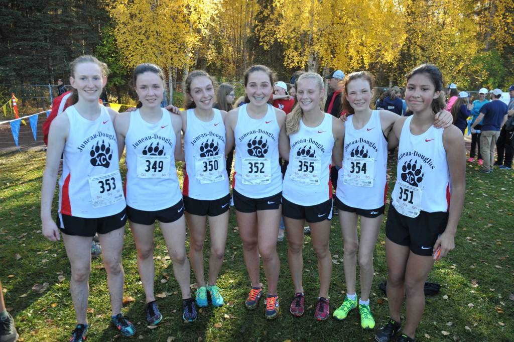 The 2018 Division I girls cross country state championship team. From left: McKenna McNutt, Jasmin Holst, Anna Iverson, Katie McKenna, Sadie Tuckwood, Annika Schwartz, Trinity Jackson. (Michael Dinneen | For the Juneau Empire)