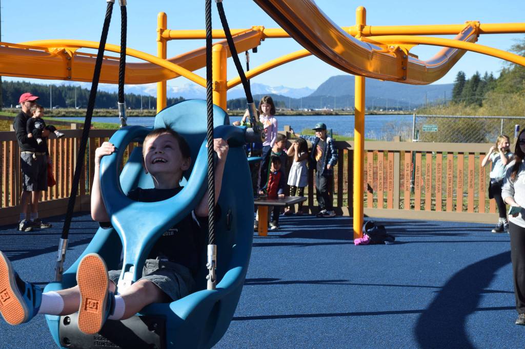 The newly-opened Project Playground includes a pair of zip lines at the back of the park. (Kevin Gullufsen | Juneau Empire)