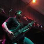 Trentyn Days, bassist for Distance Defined, plays during the Fall Freakshow concert at Juneau Arts & Culture Center. Trentyns brother, Trevyn, plays guitar for Distance Defined, both brothers are originally from Juneau. Their Mother, Cassandra Days, was head banging and singing along in the audience.