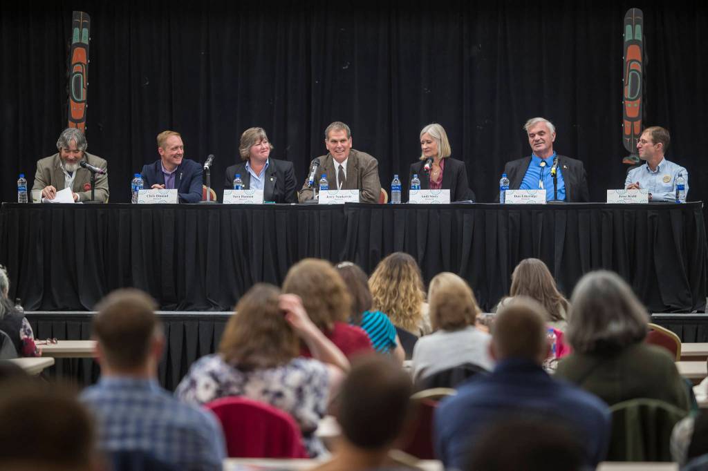 Legislative candidates answers questions during the Native Issues Forum at the Elizabeth Peratrovich Hall on Tuesday, Sept. 25, 2018. From left: Moderator Rep. Sam Kito III, D-Juneau, House District 33 candidates Chris Dimond and Sara Hannan, House District 34 candidates Jerry Nankervis and Andi Story, and Senate District Q candidates Don Etheridge and Jesse Kiehl. (Michael Penn | Juneau Empire)