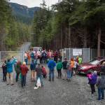 A small audience watches as city officials hold a ribbon cutting ceremony to officially open the West Douglas Pioneer Road on Friday, Sept. 28, 2018. (Michael Penn | Juneau Empire)