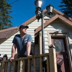 Dave dAmato, an attorney working for Kathleen Barrett, spends Monday, Oct. 1, 2018, boarding up the house at 401 Harris Street. The house was vacated this weekend after a judge ordered its residents (including co-owner James Barrett) to leave due to code and safety violations. (Michael Penn | Juneau Empire)