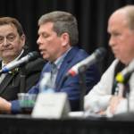 Former U.S. Sen. Mark Begich, left, and Gov. Bill Walker pass Mike Dunleavys name plate during a Special Native Issues Forum for governor candidates at the Elizabeth Peratrovich Hall on Tuesday, Oct. 2, 2018. Libertarian candidate Billy Toien, out of picture to the left, requested the name plate. Dunleavy did not attend the forum. (Michael Penn | Juneau Empire)                                Libertarian candidate Billy Toien, left, listens to former U.S. Sen. Mark Begich, center, and Gov. Bill Walker during a Special Native Issues Forum for governor candidates at the Elizabeth Peratrovich Hall on Tuesday, Oct. 2, 2018. (Michael Penn | Juneau Empire)