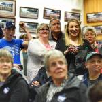 Beth Weldon and supports react to a lead in the polls as results came in live at Election Central at City Hall on Oct. 2, 2018. (Michael Penn | Juneau Empire)