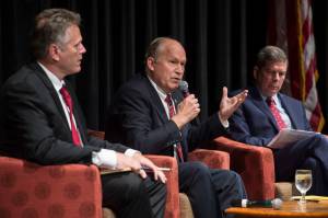 Former state Senate Mike Dunleavy, left, Gov. Bill Walker, center, and former U.S. Senator Mark Begich debate during a Juneau Chamber of Commerce luncheon at Centennial Hall on Thursday, Sept. 6, 2018. (Michael Penn | Juneau Empire File)