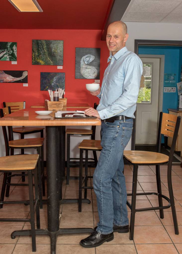 Oct. 14, 2018: Alec Nevalainen knows how to dress for casual Friday in effortless but classic pieces. This day he wore a Jeremy Argyle NYC button-down blue and white check shirt, Levis slim fit jeans, Born black leather derby shoes and a black leather belt. Easy but professionalhis look is perfect for enjoying a cup of coffee while getting a little work done at Gonzos.