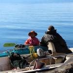 Gary and Meyers Chuck neighbor Lee discuss the eternal quest of floathouse dwellers. (Tara Neilson | For the Capital City Weekly)