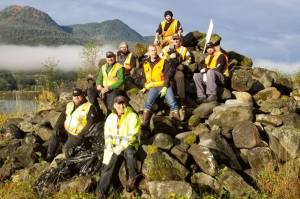 A GCI crew picks up roadside litter on the piece of Glacier Highway adopted by Big Brothers Big Sisters at the intersection of Ross Way and Glacier Avenue out to the intersection of Egan. From left to right on the bottom row are Westly Norstrom and Jorge Olave Munoz. From left to right in the middle row are Ron Peterson, Ray Filip, Rick Comins, Ron P.lesac and Hector Lopez. At the top is Payden Wellard. (Courtesy Photo | United Way of Southeast Alaska)