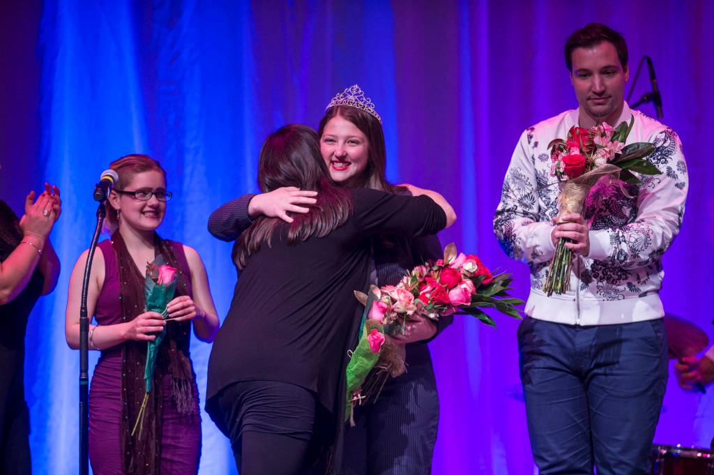 Briannah Letter, center, is crowned the champion Diva with Richard Carter, right, as first runner-up, and Lydia Rail, left, second runner-up, at her side at Juneau Lyric Operas production of Whos Your Diva? at Centennial Hall on Saturday, Sept. 29, 2018. (Michael Penn | Juneau Empire)