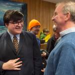 School Board candidate Kevin Allen, left, is congratulated by School Board President Brian Holst during Election night in the Assembly chambers on Tuesday, Oct. 2, 2018. (Michael Penn | Juneau Empire)
