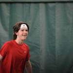 William Smoker smiles at the gallery after a great return against West Anchorage in the first round of the ASAA/First National Bank Alaska State Tennis Championships at the Alaska Club East in Anchorage on Friday, Oct. 5, 2018. (Michael Dinneen | For the Juneau Empire)