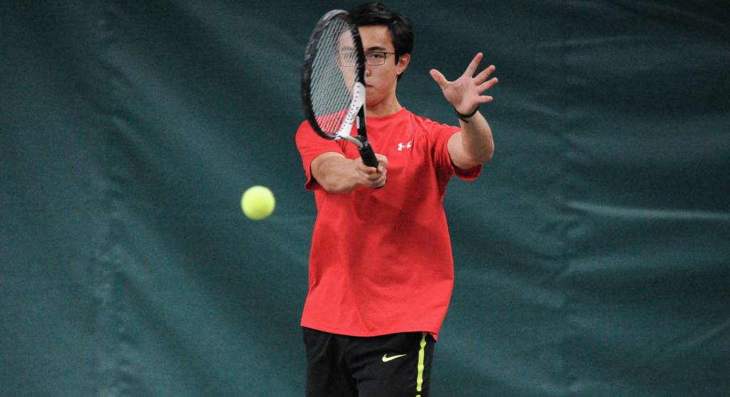 River Reyes-Boyer makes a return against West Anchorage in the first round of the ASAA/First National Bank Alaska State Tennis Championships at the Alaska Club East in Anchorage on Friday, Oct. 5, 2018. (Michael Dinneen | For the Juneau Empire)                                River Reyes-Boyer makes a return against West Anchorage in the first round of the ASAA/First National Bank Alaska State Tennis Championships at the Alaska Club East in Anchorage on Friday, Oct. 5, 2018. (Michael Dinneen | For the Juneau Empire)