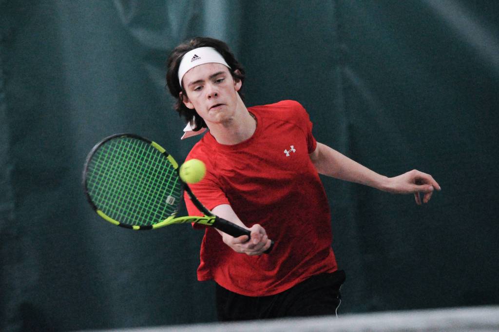Willam Smoker makes a return against West Anchorage in the first round of the ASAA/First National Bank Alaska State Tennis Championships at the Alaska Club East in Anchorage on Friday, Oct. 5, 2018. (Michael Dinneen | For the Juneau Empire)
