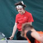 William Smoker reacts to a missed return against West Anchorage in the first round of the ASAA/First National Bank Alaska State Tennis Championships at the Alaska Club East in Anchorage on Friday, Oct. 5, 2018. (Michael Dinneen | For the Juneau Empire)
