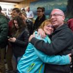 Assembly District 2 Wade Bryson hugs his wife, Christine, as he moves into the second spot during Election night in the Assembly chambers on Tuesday, Oct. 2, 2018. (Michael Penn | Juneau Empire)