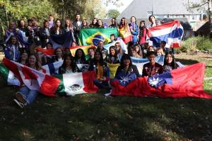 Flags and students from around the world! You can see me and the other Americans holding the AK flag and a tiny Old Glory. (Bridget McTague | For the Juneau Empire)