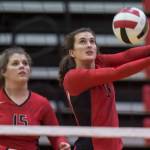 Juneau-Douglas Addie Prussing bumps the ball as she is backed up by teammate Skylar Hickok against Ketchikan during the JIVE Tournament at Juneau-Douglas High School on Friday, Oct. 12, 2018, (Michael Penn | Juneau Empire)