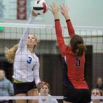 Thunder Mountains Lilyan Smith spikes the ball against Juneau-Douglas JoJo Griggs during the JIVE Tournament at Juneau-Douglas High School on Friday, Oct. 12, 2018.(Michael Penn | Juneau Empire)