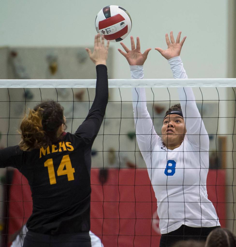 Thunder Mountains Kyra Jenkins Hayes, right, and Mount Edgecumbes Haley Sweet-Cushing compete for control of the ball during the JIVE Tournament at Juneau-Douglas High School on Friday, Oct. 12, 2018. (Michael Penn | Juneau Empire)