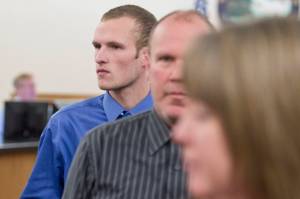 Ty Alexander Grussendorf, 22 at the time, follows his parents out of Juneau Superior Court after a trial date-setting hearing on Wednesday, March 1, 2017. (Michael Penn | Juneau Empire File)