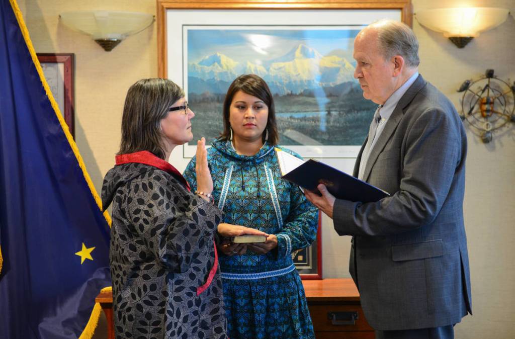 Valerie Davidson, left, takes the oath of office as Alaskas lieutenant governor on Tuesday, Oct. 16, 2018 from Gov. Bill Walker in Anchorage. (Office of the Governor | Courtesy photo)