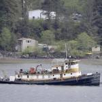 The tugboat Lumberman is seen aground in Gastineau Channel on Monday, May 21, 2018. (Michael Penn | Juneau Empire File)