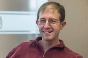 Jesse Kiehl, running as a Democrat for state Senate District Q, talks about his campaign during an interview at the Juneau Empire on Thursday, Oct. 18, 2018. (Michael Penn | Juneau Empire)