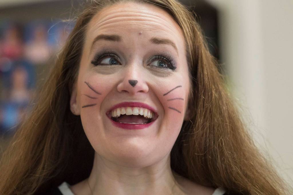 Jessie Snyder gives a primer on face painting for Halloween at her Mendenhall Valley home on Thursday, Oct. 18, 2018. (Michael Penn | Juneau Empire)