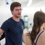 Diving coach Nathan Teal helps Thunder Mountain High School senior Amber Kahklen during practice at the Augustus Brown Swimming Pool on Wednesday, Oct. 17, 2018. (Michael Penn | Juneau Empire)