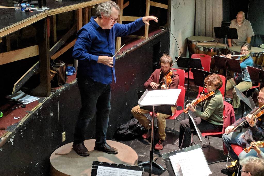 William Todd Hunt, artistic director and conductor for The Princess Sophia Opera conducts during rehearsal for the opera. It opens Thursday. (Ben Hohenstatt | Capital City Weekly)