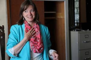 In this July 28, 2018, photo, Alyse Galvin addresses a group of volunteers in Anchorage, Alaska, before they set out to campaign door-to-door on her behalf. Galvin is running against incumbent U.S. Rep. Don Young in the Nov. 6 Election Day. (AP Photo/Mark Thiessen)