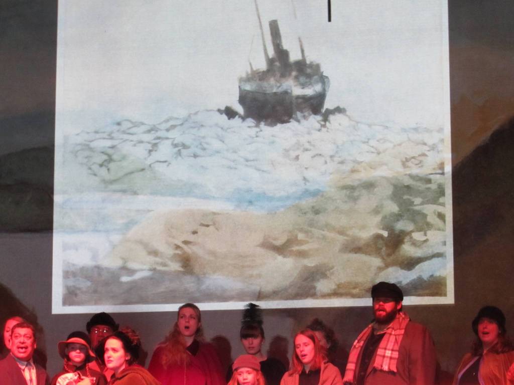 Laser projectors and work by Greg Mitchell, projection designer for The Princess Sophia, allow artwork to tower as a backdrop for The Princess Sophia opera. Local artist Dan Fruits produced 25 pieces of Sophia-themed work for the opera. Fruits said hes been impressed by what Mitchell was able to do with them. (Ben Hohenstatt | Capital City Weekly)