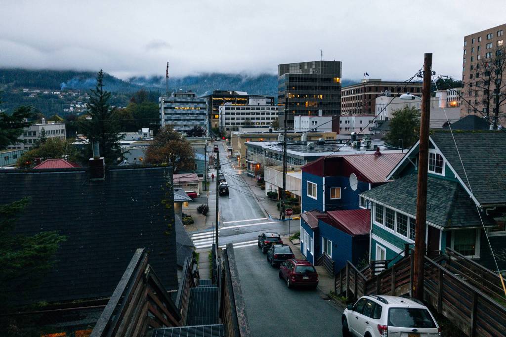 Downtown in low clouds at dusk. 10 seconds from road. (Gabe Donohoe | For the Juneau Empire)