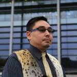 Verner Wilson, Friends of the Earth, formerly of Bristol Bay Native Association and member of Curyung Tribal Council, stands in front of the UK HQ of cruise industry giant Carnival Corporation. (Courtesy Photo | Jiri Rezac via Stand.earth)