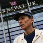 Delbert Pungowiyi, Alaska, President of Native Village of Savoonga (on St. Lawrence Island near the Bering Strait) stands in front of the UK HQ of cruise industry giant Carnival Corporation. (Courtesy Photo | Jiri Rezac via Stand.earth)