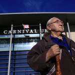 George Edwardson, board member for Inuit Circumpolar Council-Alaska and President of the Inupiat Community of the Arctic Slope (ICAS) stands in front of the UK HQ of cruise industry giant Carnival Corporation. (Courtesy Photo | Jiri Rezac via Stand.earth)