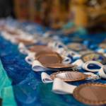 Medals are arranged on a table in the Juneau Gun Clubhouse for the Southeast Fall Shoot Tournament hosted by the Juneau Gun Club and Juneau Trap Team. (Nolin Ainsworth | Juneau Empire)