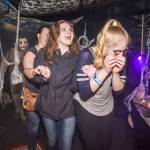 Juneau residents react to scares and chills as they make their way through the Haunted Station at the U.S. Coast Guards Station Juneau on Friday, Oct. 26, 2018. Station personnel pay for all the decoration themselves and take three weeks to ready the station. Entry is non perishable food items for the Southeast Alaska Food Bank. (Michael Penn | Juneau Empire)