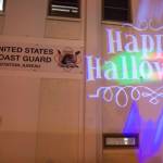 Juneau residents react to scares and chills as they make their way through the Haunted Station at the U.S. Coast Guards Station Juneau on Friday, Oct. 26, 2018. Station personnel pay for all the decoration themselves and take three weeks to ready the station. Entry is non perishable food items for the Southeast Alaska Food Bank. (Michael Penn | Juneau Empire)
